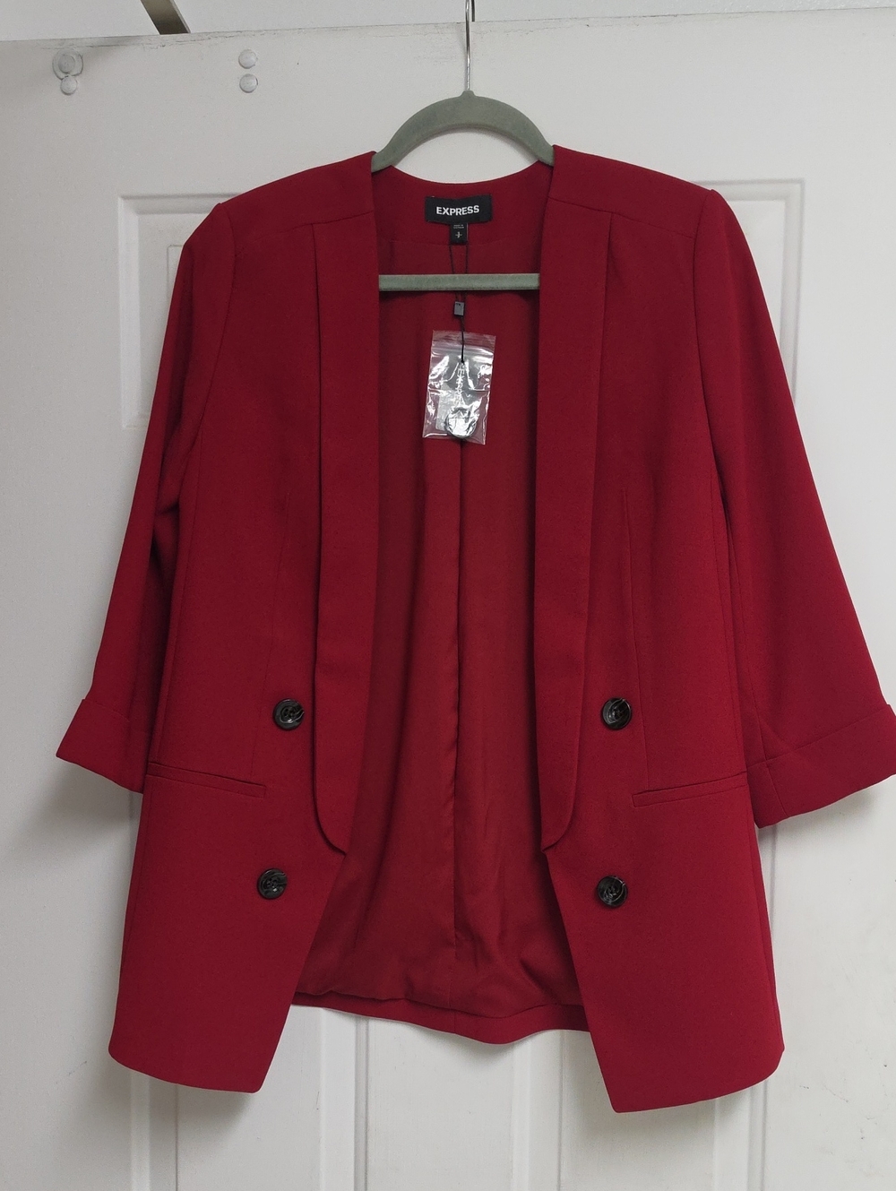 Open-front tailored blazer with 3/4 cuffed sleeves and faux-double-breasted butt